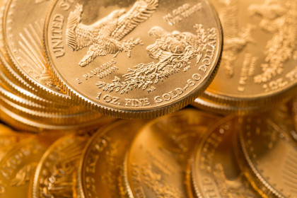 Kaj pomeni oznaka 1 oz na investicijskem zlatem ali srebrnem kovancu
